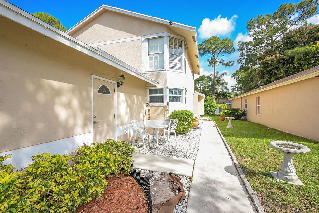 Photo of 5545 Berry Blossom Way W, West Palm Beach, FL 33415 (MLS # R10968363)