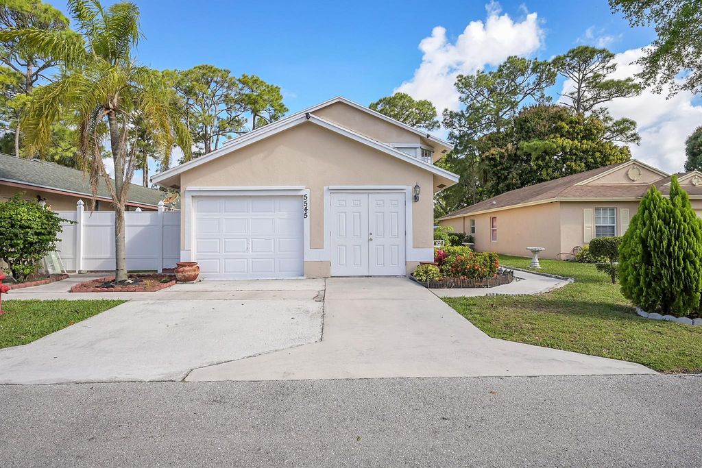 Photo of 5545 Berry Blossom Way W, West Palm Beach, FL 33415 (MLS # R10968363)