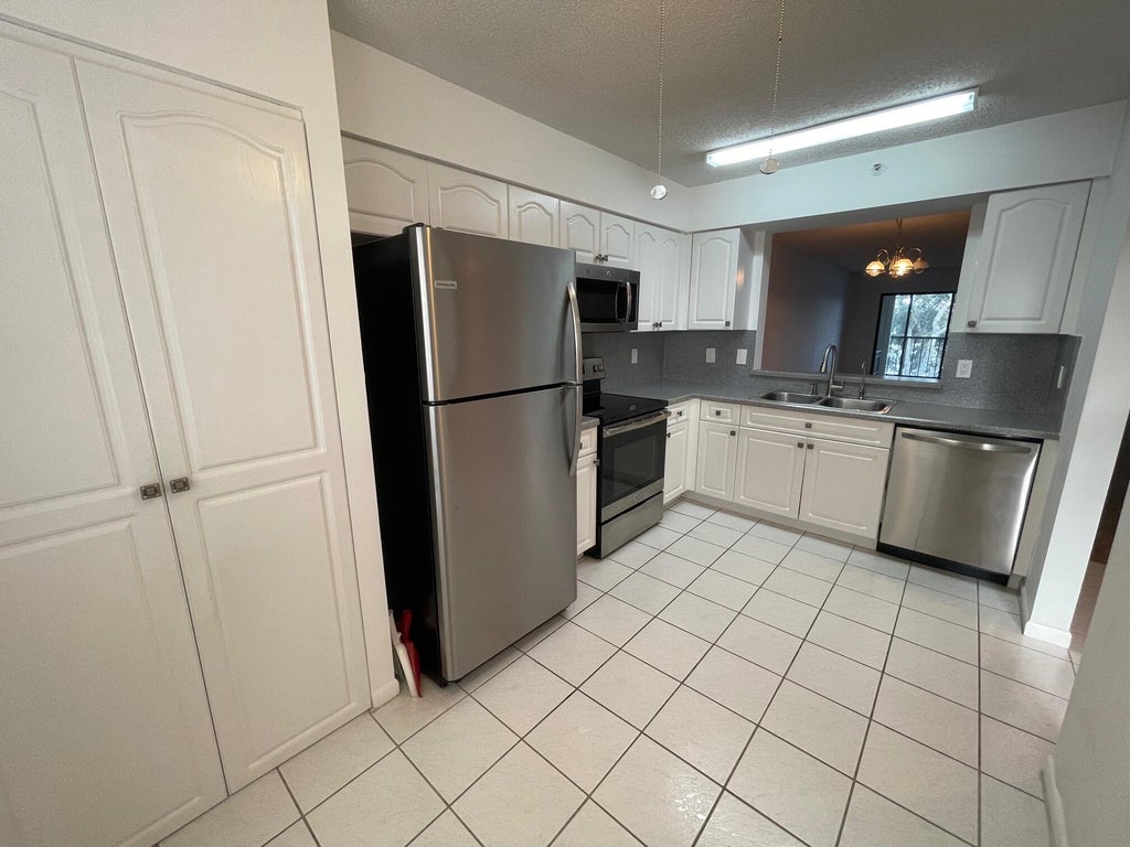 Photo of 6269 Pointe Regal Circle #402, Delray Beach, FL 33484 (MLS # R10923073)