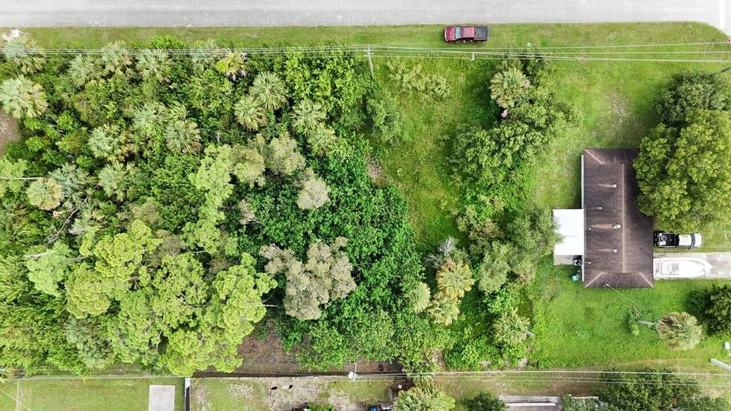 Photo of 7606 Miramar Avenue, Fort Pierce, FL 34951 (MLS # R11128896)