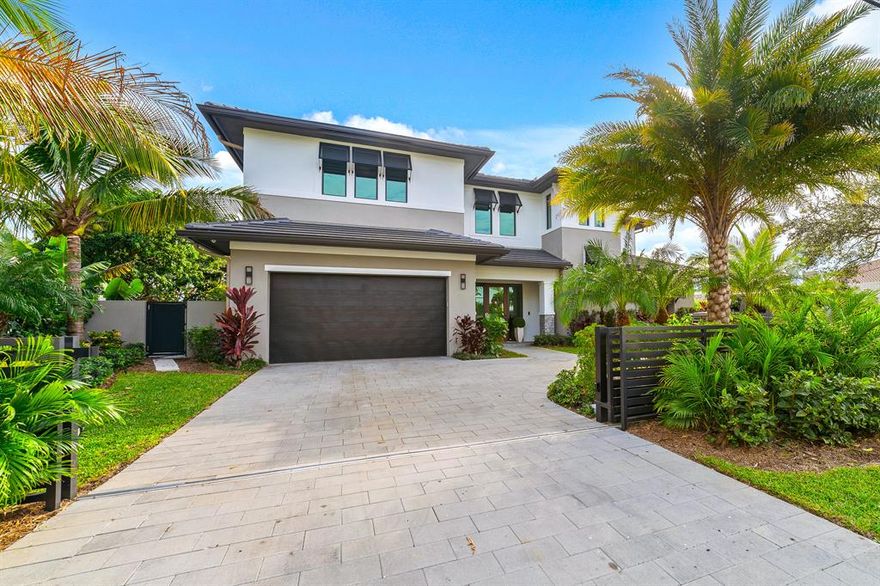 This spectacular New & Modern Home (2021 c/o) located in Bel-Marra, a highly sought-after waterfront community, offers stunning design finishes throughout and a true waterfront PARADISE! Entering the home, you are sure to be captivated by breathtaking water views. Featuring 5 bedrooms and 5 baths, you will revel in an impressively large and open kitchen with spacious dining and living room spaces. You'll enjoy a large bonus room that can double as a bedroom, media room, or game room with an incredible wet bar and ample storage. Also, enjoy a full bedroom/bathroom great for guests on the main level and an additional pool half bathroom. Outside you'll love the ultimate patio with a large salt-water pool & spa. It continues as you walk to your 80-foot dock which has an additional