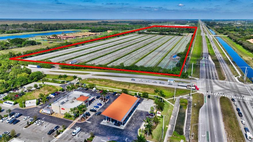 LOCATION, LOCATION, LOCATION. THE NW CORNER OF ATLANTIC AVE & 441 IN WEST DELRAY BEACH ACROSS THE STREET FROM WAWA. ACCESS FROM ATLANTIC AVENUE AS WELL AS  3 LOCATIONS ALONG 441 WITH TURNING LANES.