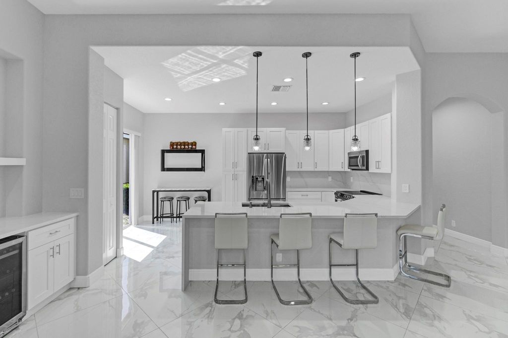Photo of 7214 NW 116th Way, Parkland, FL 33076 (MLS # F10512182)