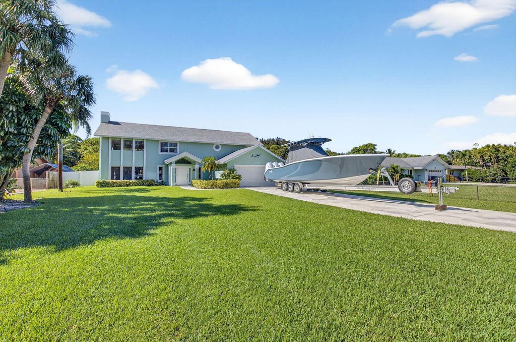 Photo of 6701 Hillside Lane, Lake Worth, FL 33462 (MLS # B26026059)