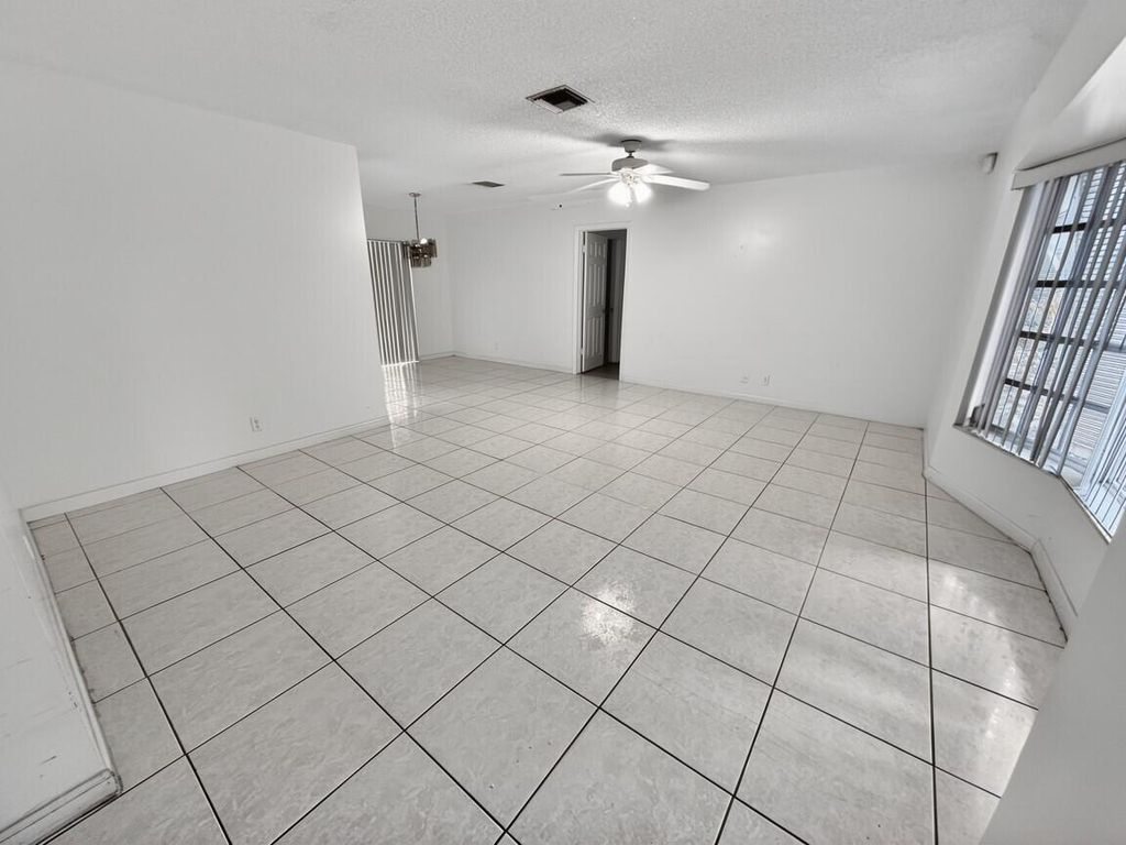 Photo of 1820 17th Court N, Lake Worth Beach, FL 33460 (MLS # R11140636)