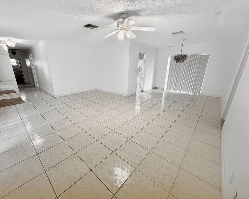 Photo of 1820 17th Court N, Lake Worth Beach, FL 33460 (MLS # R11140636)