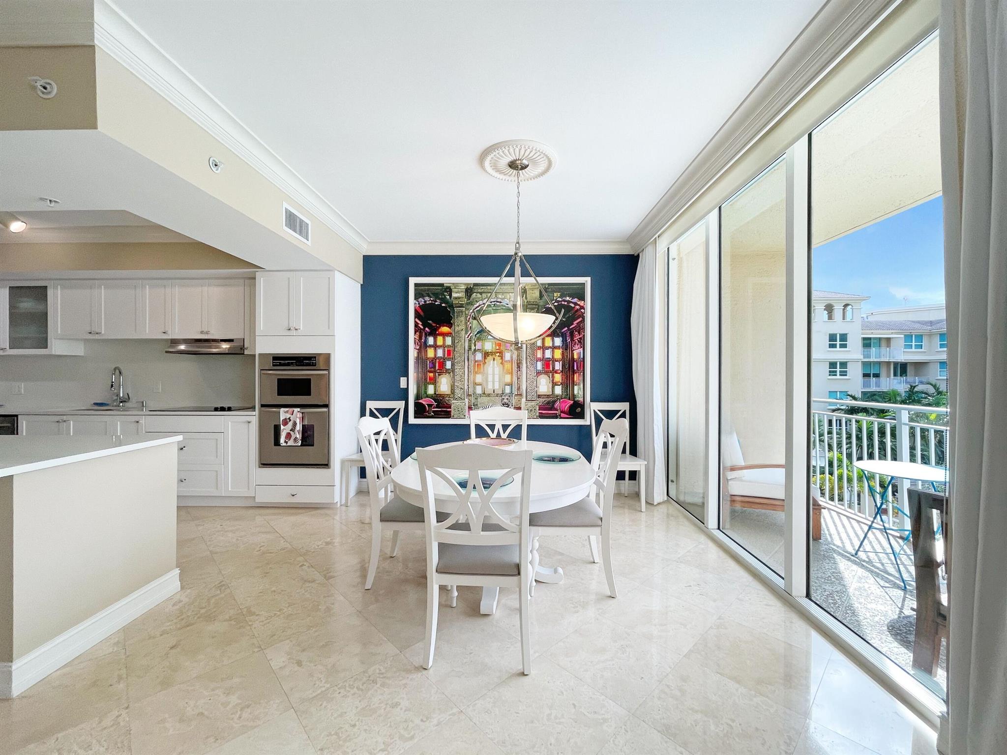 This elegant 2BR, 2.1BA penthouse offers panoramic views of the resort-style pool and 1,816 SF of beautifully appointed living space and chef's kitchen ideal to entertain. Newly renovated with designer finishes and fully furnished for comfort, this sun-soaked condo features 9-ft ceilings & two private balconies. Located in a luxury building with a business center, conference room, grand lobby, and 24/7 security. The building boasts a breathtaking resort-style pool, gym, sauna, billiards, and indoor basketball court. Valet parking, doorman, and security services included. No pets allowed. Situated just steps from Mizner Park, shopping, dining, and the beach, this prime location offers the ultimate East Boca Raton lifestyle. Live where luxury meets convenience at Palmetto Place.