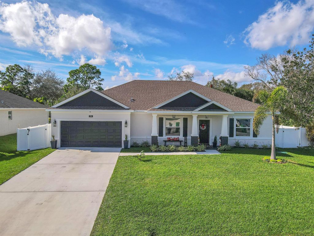 Photo of 1926 SW Ember Street, Port Saint Lucie, FL 34953 (MLS # R10950345)