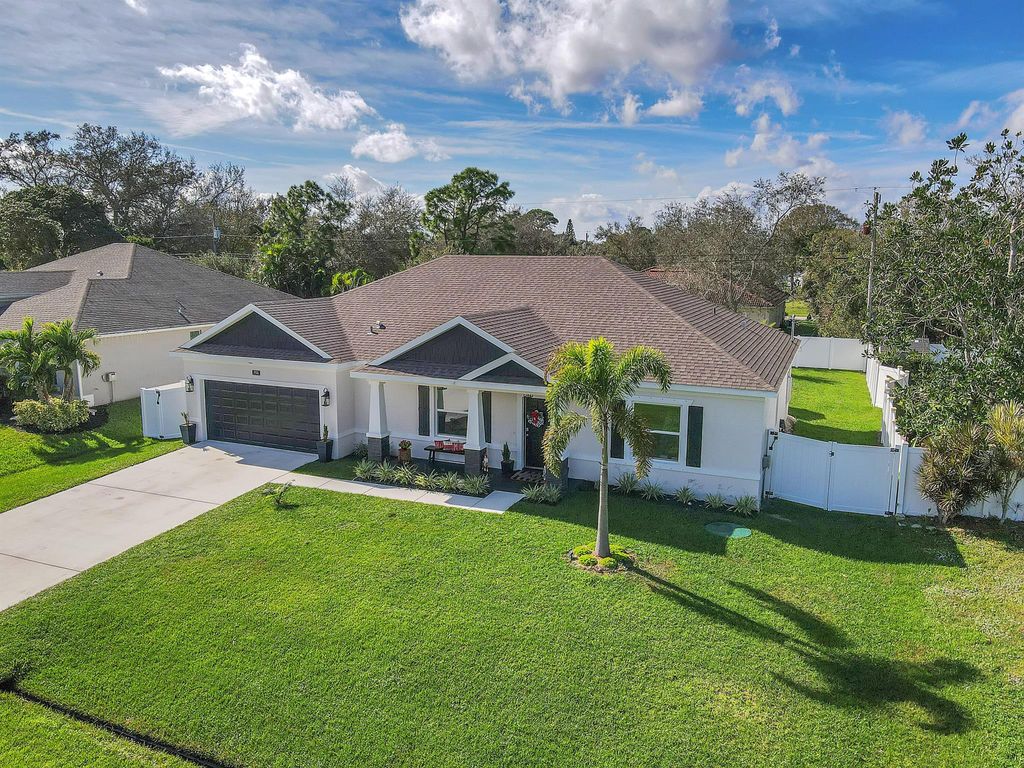 Photo of 1926 SW Ember Street, Port Saint Lucie, FL 34953 (MLS # R10950345)