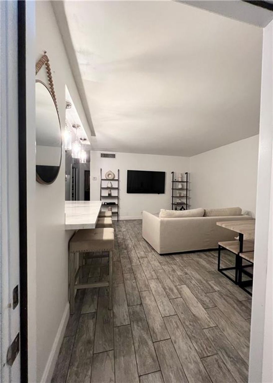 Remodeled first floor unit is centrally located, walking distance to Downtown Hollywood and 10 minutes from Hollywood Beach. 1 Bedroom 1 Bath + Den/Office AreaPorcelain floor tiles, Kitchen Countertop is made of Beautiful Calacatta Marble. The Bathroom Vanity is Onyx and the bathroom shower and bathroom floor is travertine marble. Current owners Quarterly association fee $800  VERIFY WITH ASSOCIATION DIRECTLY ASSOCIATION FEES/APPROVAL PROCESS TENANT OCCUPIED DO NOT BOTHER TENANTS, MOVING OUT PRIOR TO CLOSING. No appraisal contingency*** Equal Housing Opportunity.