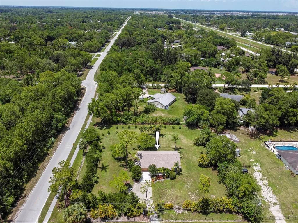 Photo of 16971 W Mayfair Drive Dr, Loxahatchee, FL 33470 (MLS # R10820315)