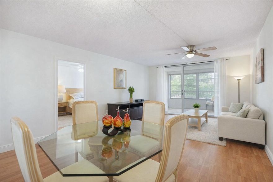 Discover this well-maintained 1-bedroom, 1-bath condo offering comfort and low-maintenance living in a desirable 55+ gated community. Conveniently located near Florida Medical Center and Oakland Medical Mall, with public transportation directly across the street. The unit features a spacious enclosed balcony overlooking lush garden views, large enough to be used as a sitting area, home office, or flexible guest space. Recent updates include a newer central A/C system (2022). Residents enjoy an elevator, laundry facilities, a community pool, and a clubhouse with billiards and social areas. Seasonal rentals permitted after the first year of ownership.