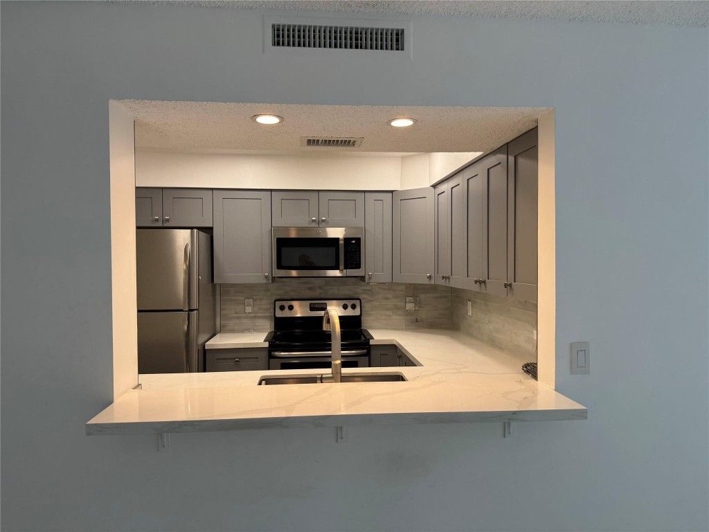 Photo of 2238 N Cypress Bend Drive #304, Pompano Beach, FL 33069 (MLS # F10435974)