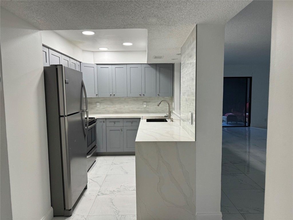 Photo of 2238 N Cypress Bend Drive #304, Pompano Beach, FL 33069 (MLS # F10435974)