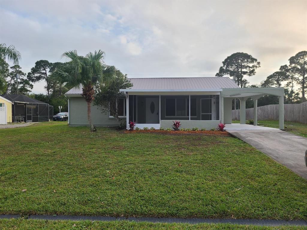 Photo of 2218 SE Seafury Lane, Port Saint Lucie, FL 34952 (MLS # R10778189)