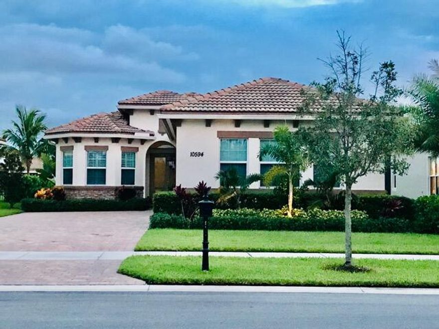 2/2, Possible 3rd BR if Closet added.  Waterfront.  3-Car Garage.  Elegance Abounds in this Isabella Model Featuring Entry Foyer, Great Room & Separate Dining Room w Tray Ceilings, Hurricane Impact Windows & Doors throughout. 3 Bay Windows, Open Plan, Kitchen has Newer SS Appliances, Wall Oven, Upgr Cooktop, SS Dual Sinks, Soft Close Doors & Pullout Drawers,  Pantry, Instant Hot Water, Reverse Osmosis Water Softener, Eat-In Area.  Huge en-suite PBR, 2 Large Custom Designed Walk-ins, PBA Dual Vanities, Roman Tub, Sep Large Walk-in Shower w comfort seat. Built  Inside Laundry. Porcelain Wood-Look Planks in Br's & Den, Plantation Shutters & Crown Molding Main Areas, A/C 2025. 11' Ceilings, Ceiling Fans, High Hat Lighting, Neutral Decor Throughout. A/C 2025, HWH W/D 2024, Gated Community. Maint includes Cable, Clubhouse w Indoor & Outdoor Pools, 26 Pickle Courts, Tennis Courts, Bocce, Exercise Room, Library, Activities ++. Assoc w PGA Golf  Window Scarves in BR's & Den, Pendant Kitchen Light, chandeliers in Kitchen neg. DR & PBR, Drapes in FR. Murphy Bed in Library do not convey.