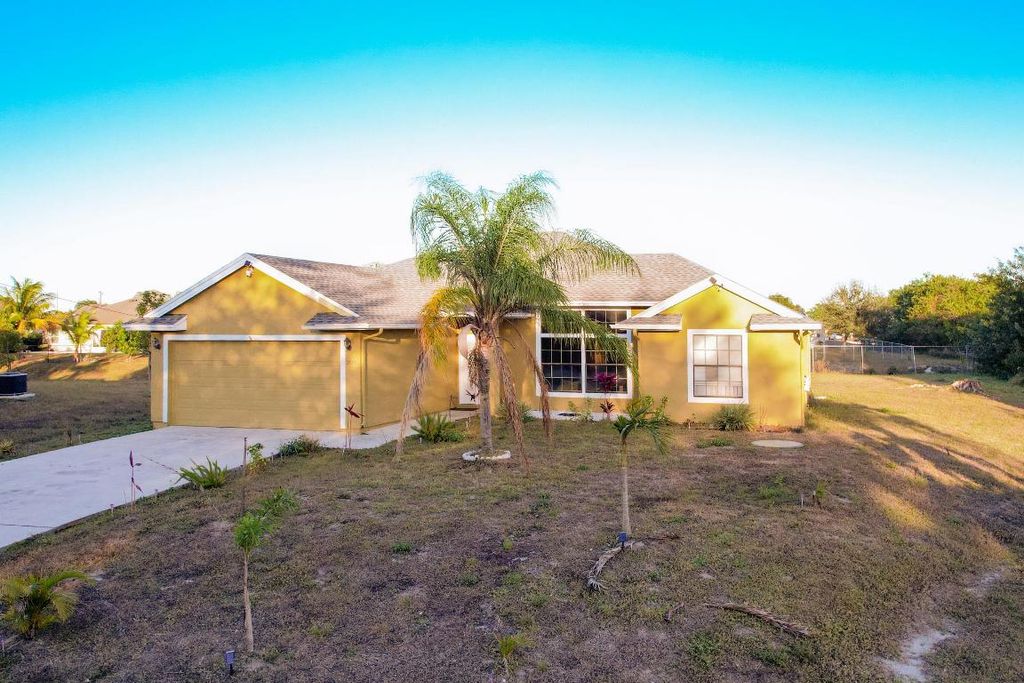 Photo of 2091 SW Castinet Lane, Port Saint Lucie, FL 34953 (MLS # R11158977)