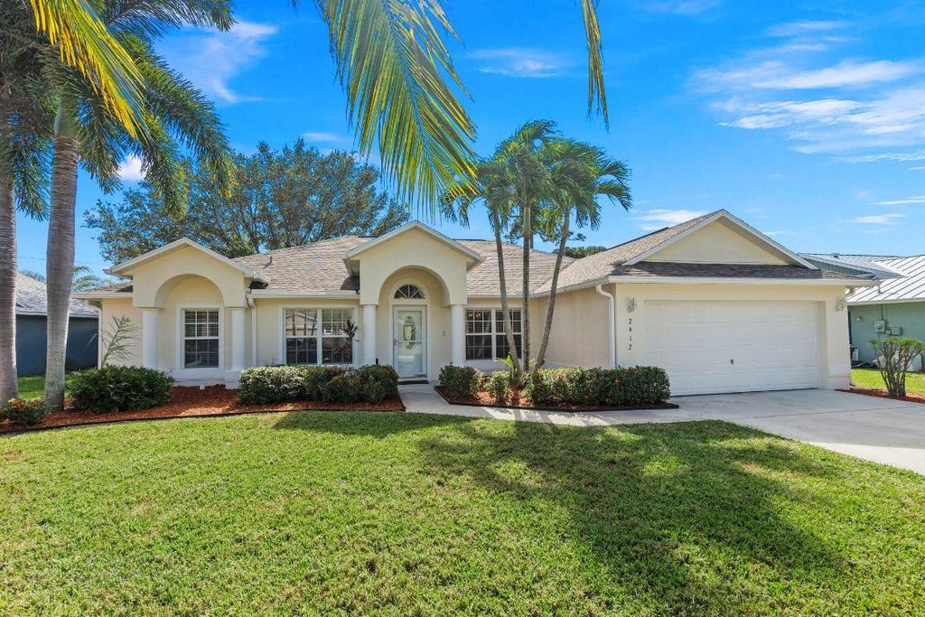 Photo of 2412 SE Alfonso Avenue, Port Saint Lucie, FL 34952 (MLS # R10936515)