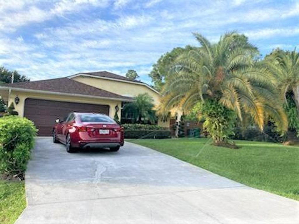 Photo of 1242 SW Melrose Avenue, Port Saint Lucie, FL 34953 (MLS # R10756342)