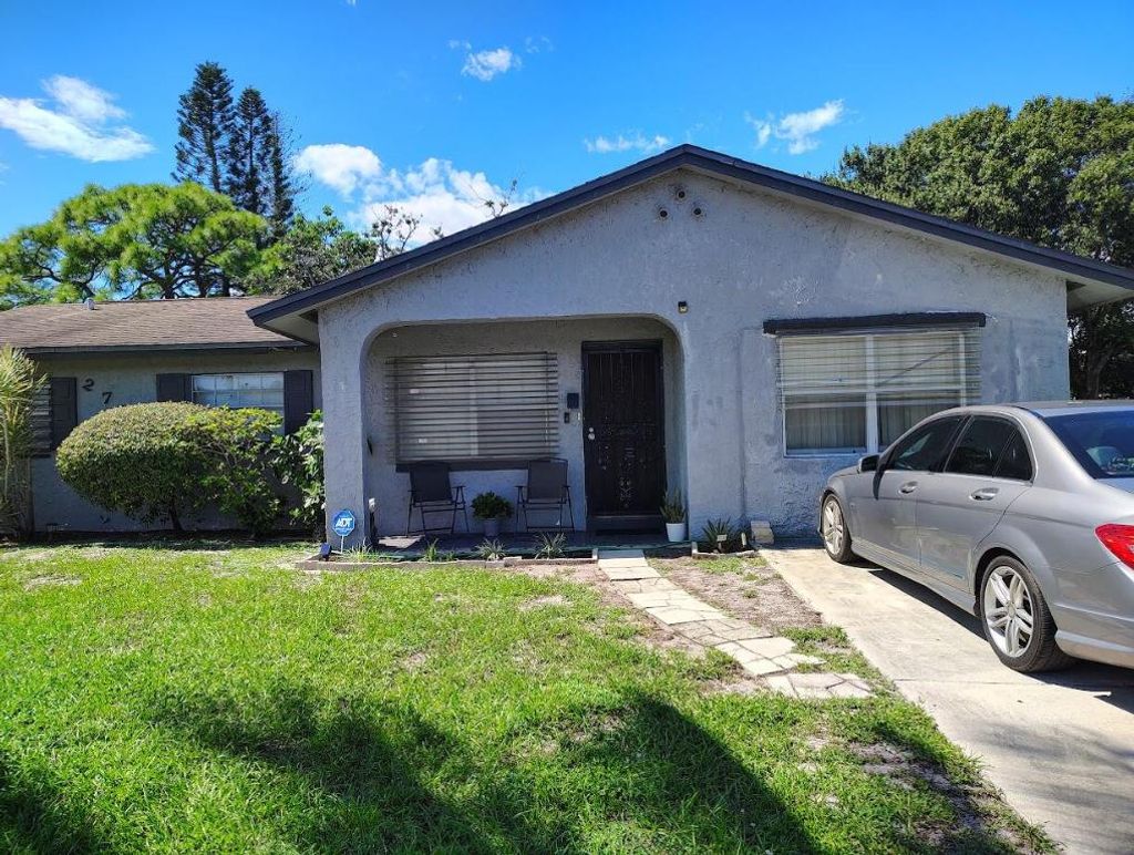 Photo of 2701 NW Essex Drive NW, Fort Pierce, FL 34946 (MLS # R11123853)
