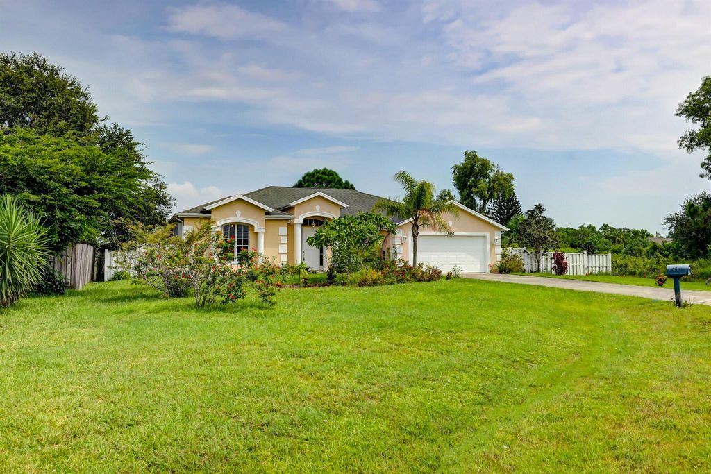 Photo of 5857 NW Dunmore Avenue, Port Saint Lucie, FL 34986 (MLS # R10914419)