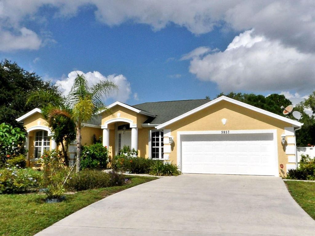 Photo of 5857 NW Dunmore Avenue, Port Saint Lucie, FL 34986 (MLS # R10914419)