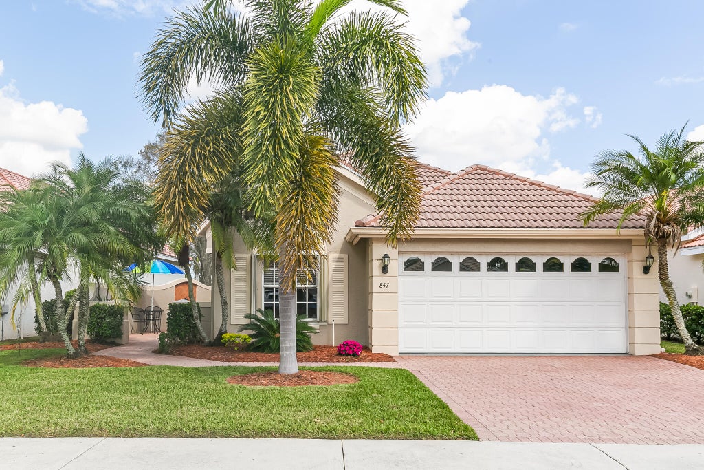 Photo of 847 SW Lake Charles Circle, Port Saint Lucie, FL 34986 (MLS # R11064178)