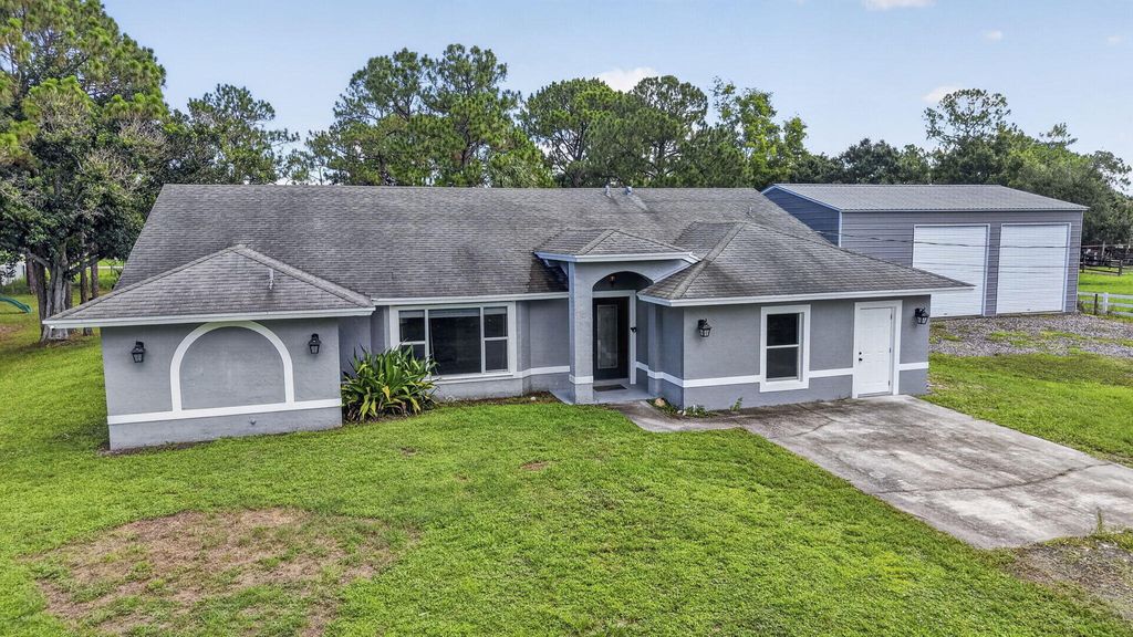 Photo of 14935 89th Place N, Loxahatchee, FL 33470 (MLS # B26049810)