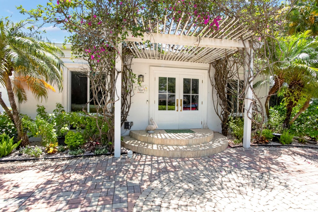 Photo of 714 S Atlantic Drive, Lantana, FL 33462 (MLS # B26073802)