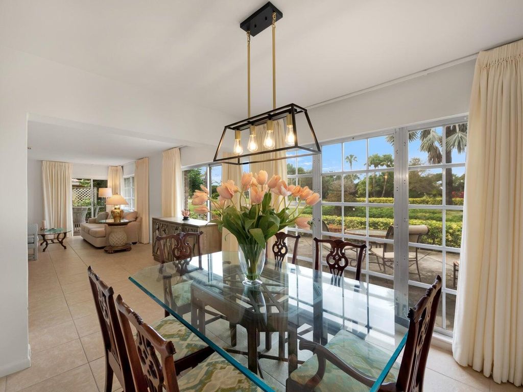 Photo of 115 Villa Circle, Atlantis, FL 33462 (MLS # R11014892)