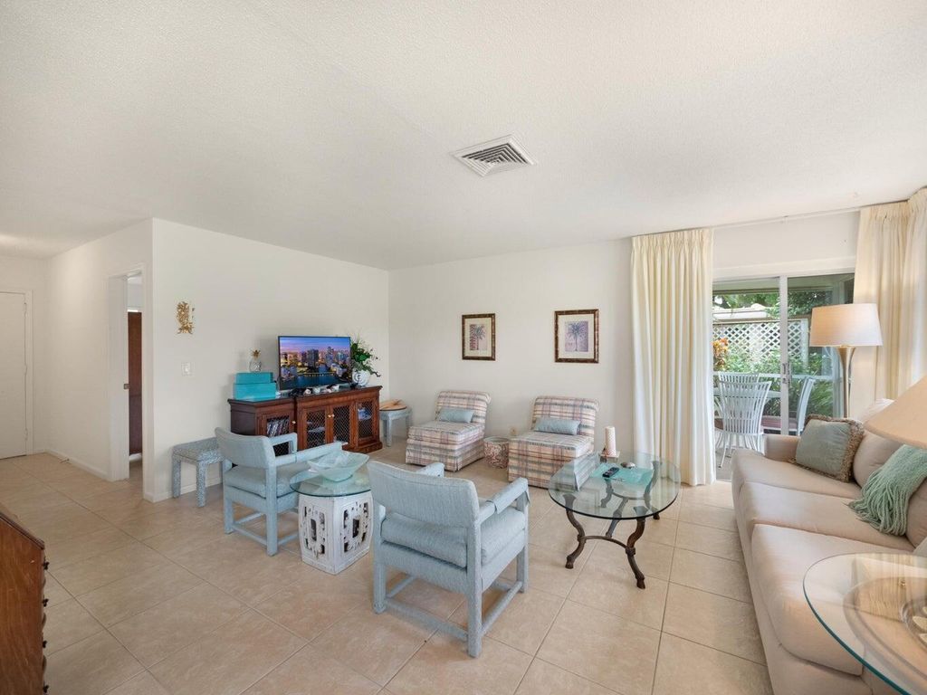 Photo of 115 Villa Circle, Atlantis, FL 33462 (MLS # R11014892)