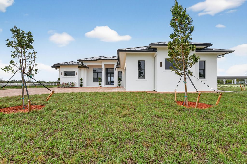 Photo of 3644 Frog Holw Holw, Loxahatchee, FL 33470 (MLS # B26001937)