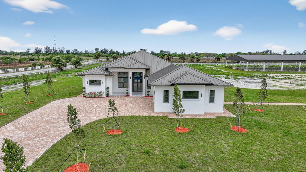 Photo of 3644 Frog Holw Holw, Loxahatchee, FL 33470 (MLS # B26001937)