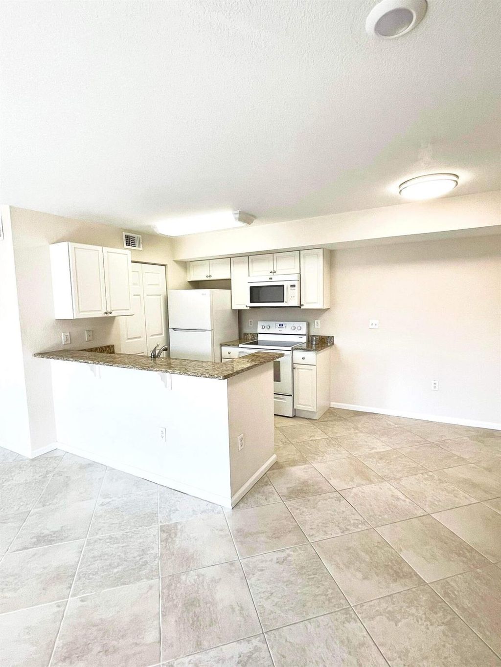 Photo of 151 SW Palm Drive SW #203, Port Saint Lucie, FL 34986 (MLS # R11075951)