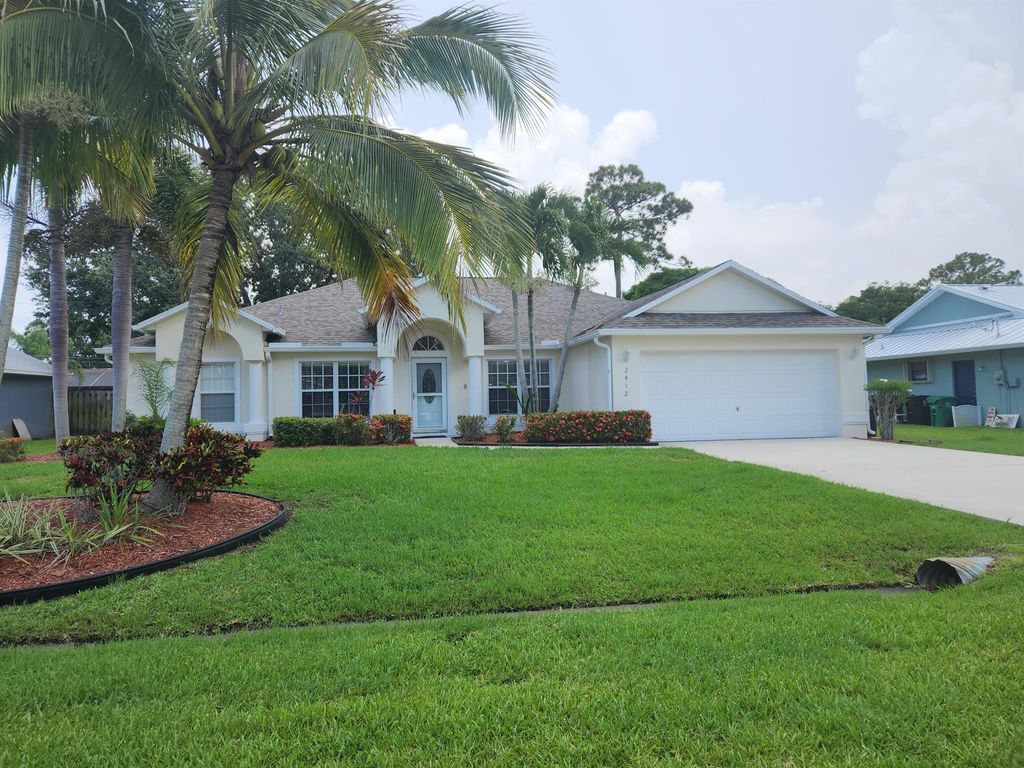 Photo of 2412 SE Alfonso Avenue, Port Saint Lucie, FL 34952 (MLS # R11000027)