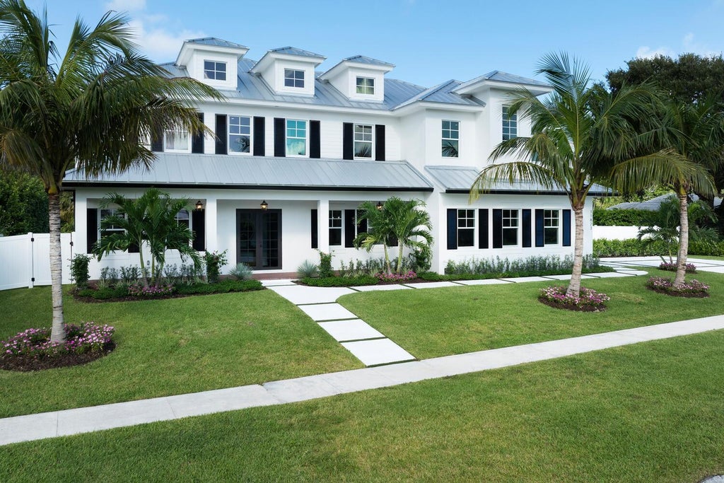 Photo of 11823 LAKE SHORE Place, North Palm Beach, FL 33408 (MLS # B26087156)
