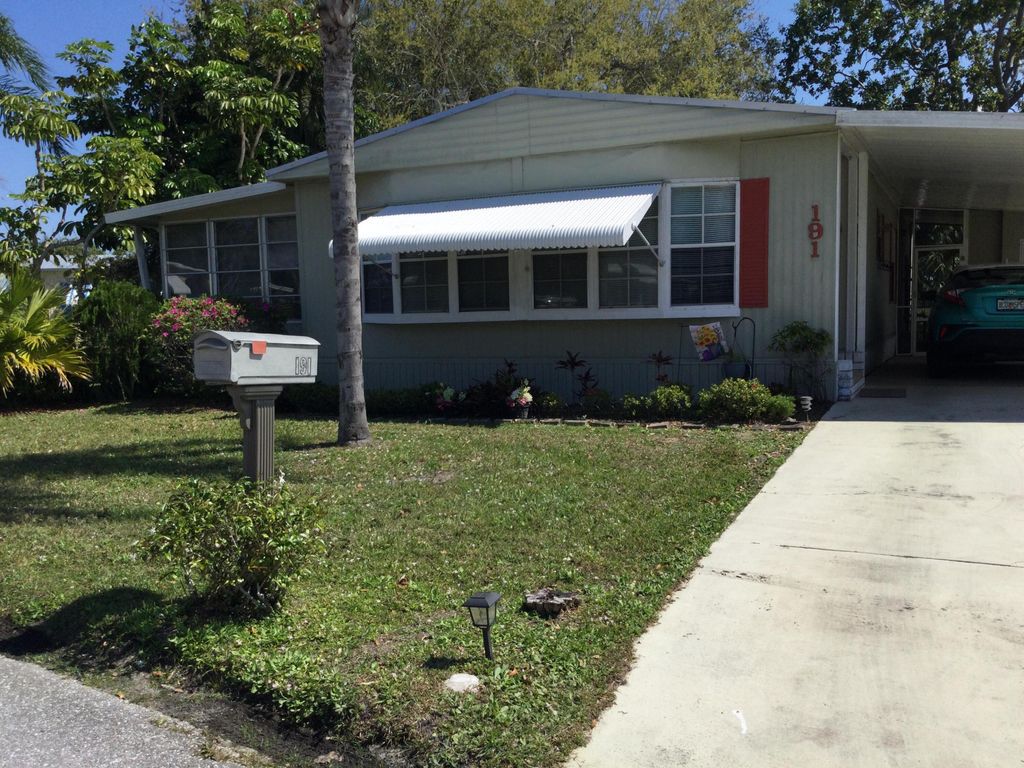 Photo of 191 W Caribbean, Port Saint Lucie, FL 34952 (MLS # R11125055)