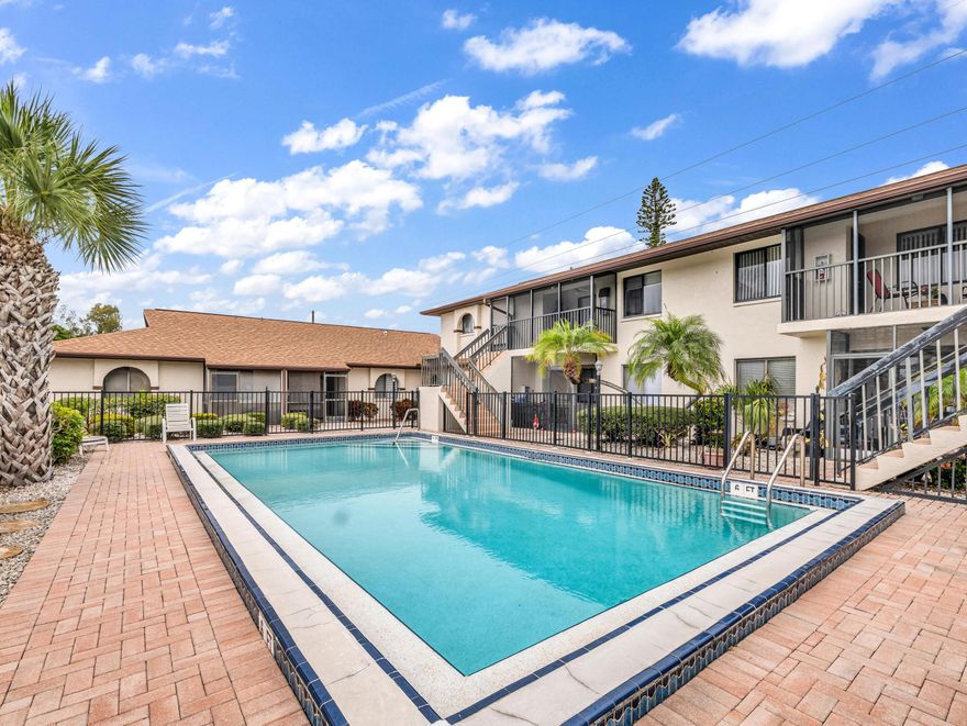 Welcome to this charming corner unit in the Kingsdown community, a one-story building that offers a comfortable living space perfect for both personal enjoyment and investment potential.  Inside, you'll find a bright open layout featuring a welcoming living area and a functional kitchen, complete with a washer and dryer for added convenience. The two spacious bedrooms provide plenty of room for rest and privacy.  Step outside to your private screened lanai, where you can enjoy a partial view of the pool—ideal for relaxing with your morning coffee or unwinding in the evening. Residents of Kingsdown also have access to the community pool and spa, enhancing the appeal of this lovely neighborhood. Conveniently located near shopping, dining, and major roads, this property is an excellent option for anyone seeking a low-maintenance lifestyle or a smart investment opportunity. Don't miss your chance to make this corner unit your new home!