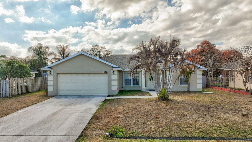 Beautifully maintained and move-in ready, this immaculate home offers comfort, style, and peace of mind. Featuring a brand-new roof, accordion hurricane shutters, new ceiling fans and lighting fixtures throughout, this home is truly turn-key. The kitchen is equipped with stainless steel appliances and granite countertops, perfect for everyday living and entertaining. The spacious owner's suite includes a walk-in closet, Roman tub and separate shower for a relaxing retreat. Enjoy outdoor living on the huge trussed patio overlooking the fully fenced yard, complete with a shed and plenty of room for a future pool. With modern upgrades, generous outdoor space and exceptional care throughout, this home is a must-see. Close to Shopping, 95 and Turnpike.