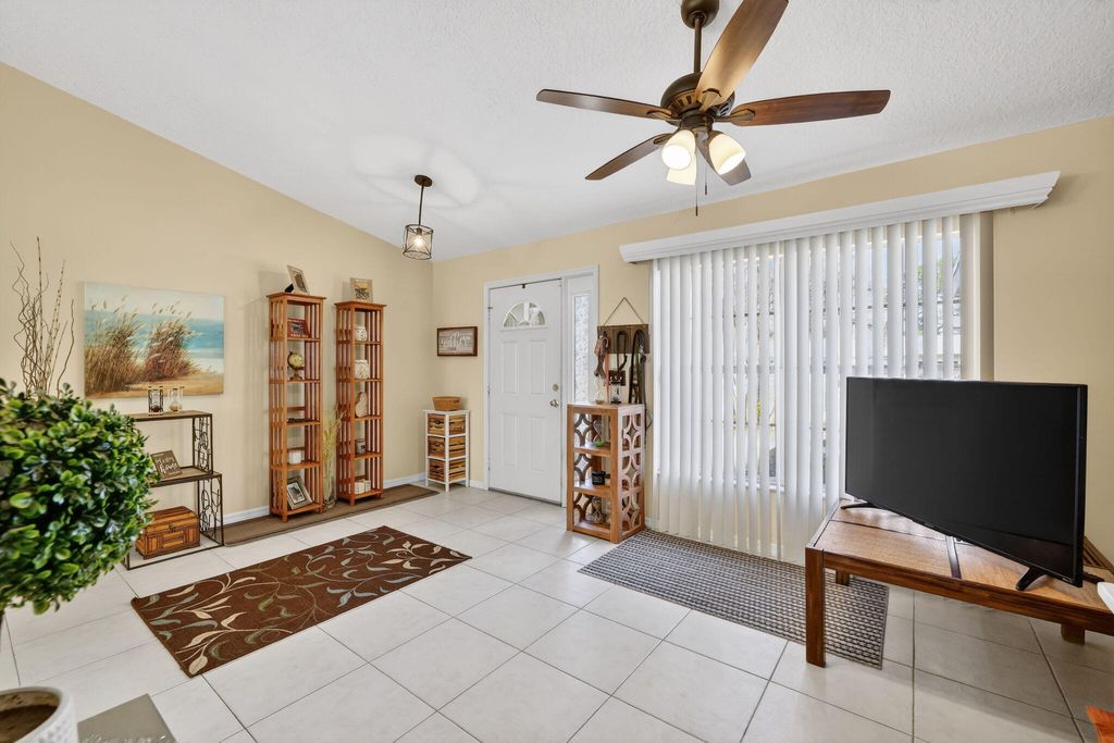 Photo of 1534 SW Hutchins Street, Port Saint Lucie, FL 34983 (MLS # R11164308)