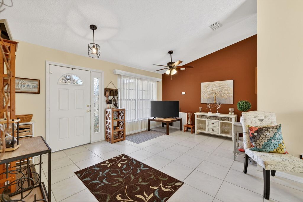 Photo of 1534 SW Hutchins Street, Port Saint Lucie, FL 34983 (MLS # R11164308)