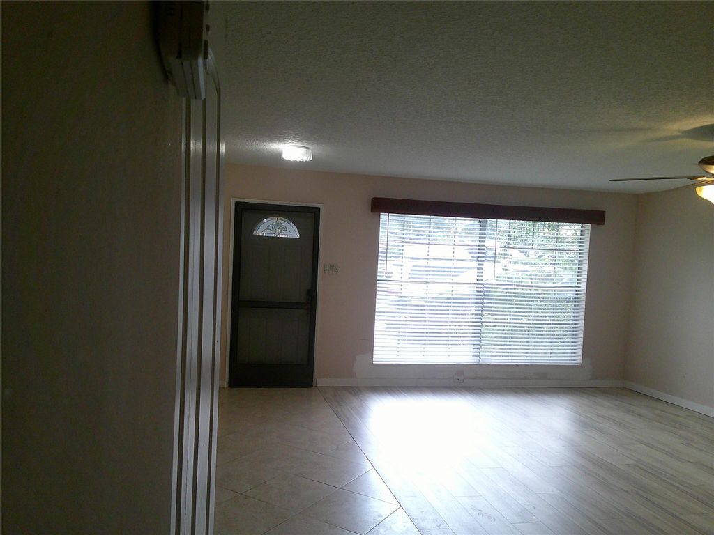 Photo of 4291 Coral Springs Dr, Coral Springs, FL 33065 (MLS # F10518791)