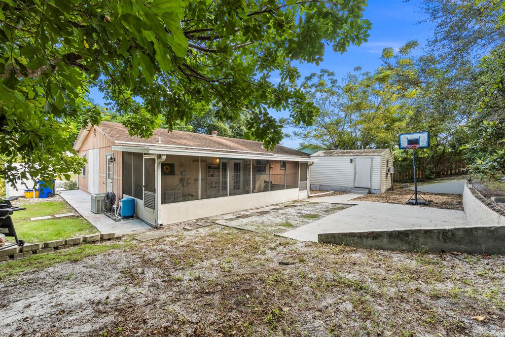 Photo of 1720 NE 23rd Terrace, Jensen Beach, FL 34957 (MLS # R10930213)