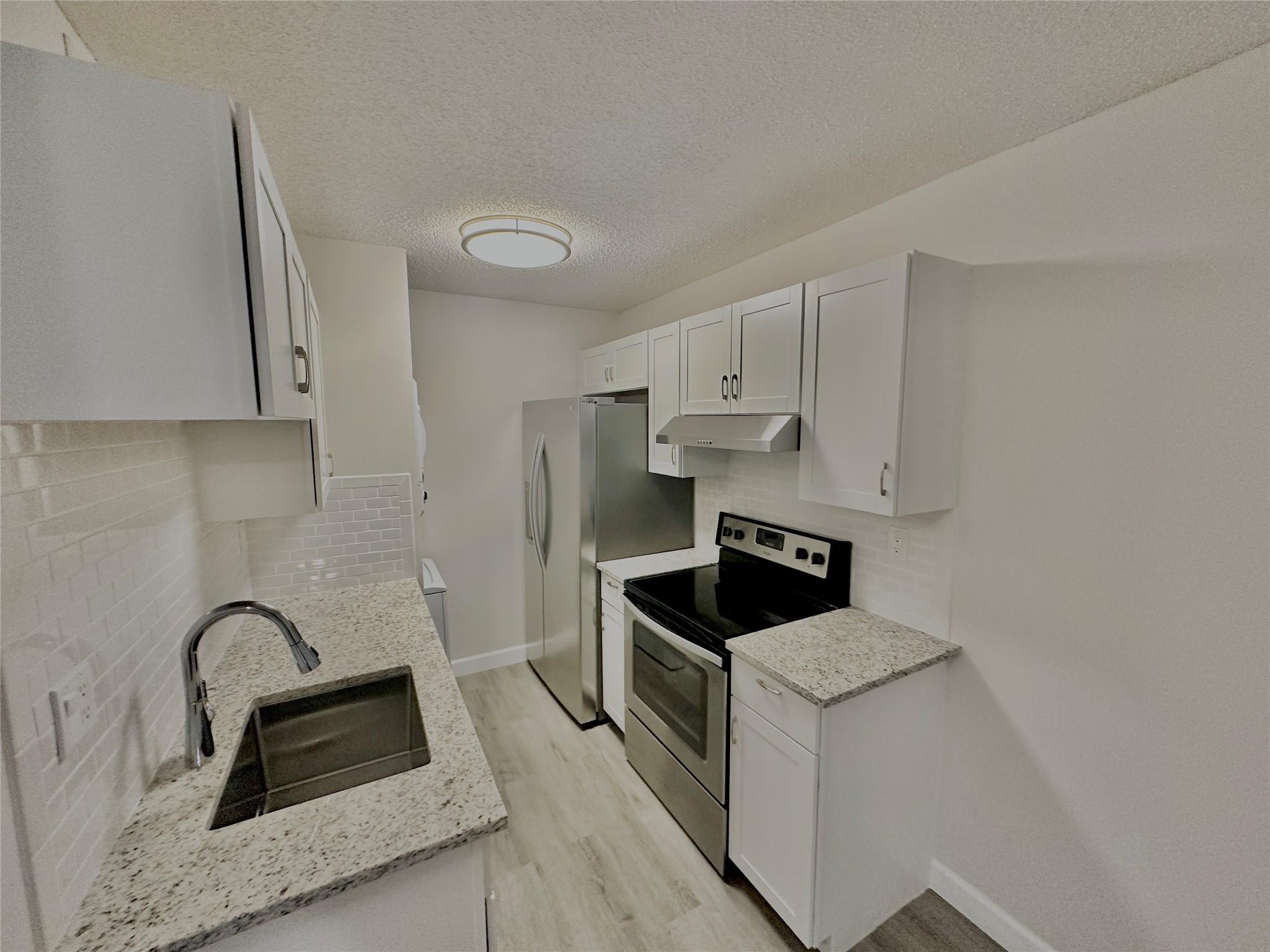 COMPLETELY REMODELED condo in this highly desirable community of Orange Tree of Coral Springs. 2 BED / 2 BATH condo on 2nd floor. OK to lease right away. GREAT RENTAL INCOME POTENTIAL.