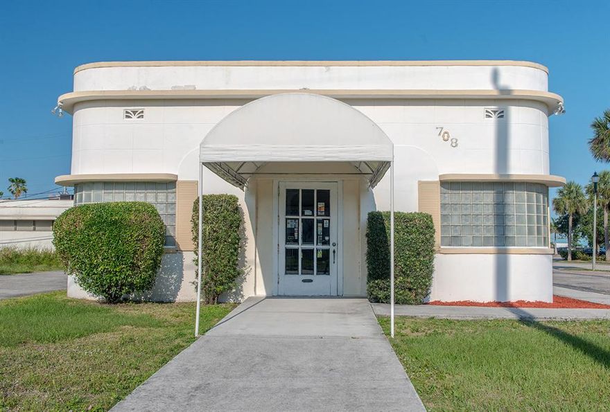 Interesting Vintage building suitable for many different types of businesses.  Driveway goes all around the building and can be entered from Georgia or South 6th Street.  Currently 7+ offices.  Busy shopping center across the street.  C1 zoning in a well-established neighborhood.  Close to Federal Courthouse and downtown Fort Pierce.