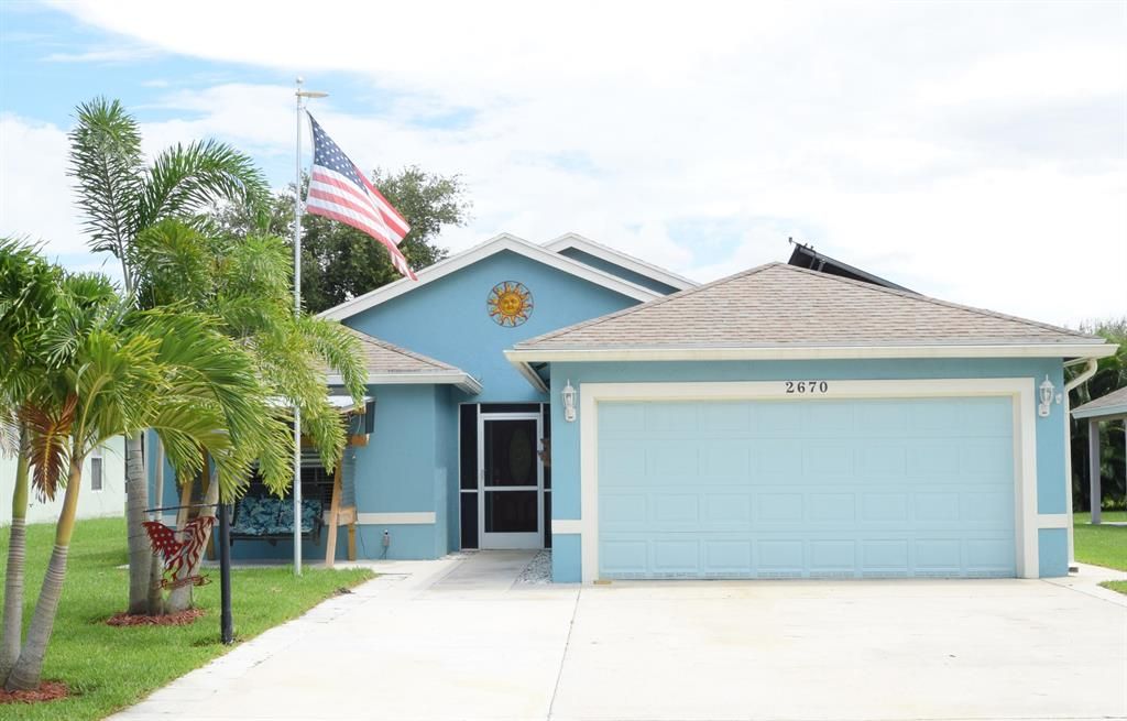 Photo of 2670 SW Versailles Terrace, Stuart, FL 34997 (MLS # R10732080)