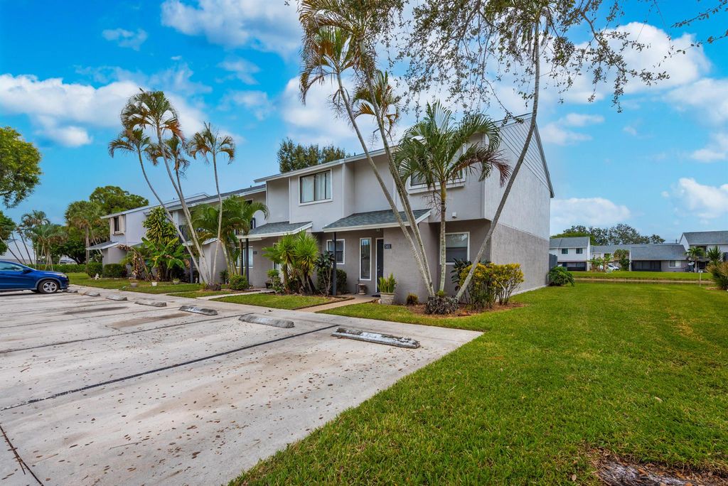 Photo of 3401 Poolside Drive, Greenacres, FL 33463 (MLS # R10937080)