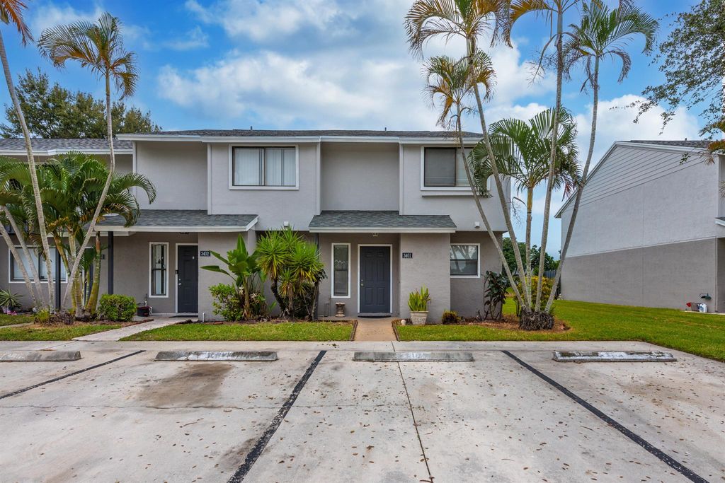 Photo of 3401 Poolside Drive, Greenacres, FL 33463 (MLS # R10937080)