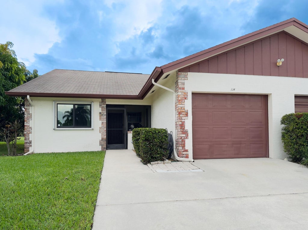 Photo of 114 Moccasin Trail S, Jupiter, FL 33458 (MLS # R11024334)
