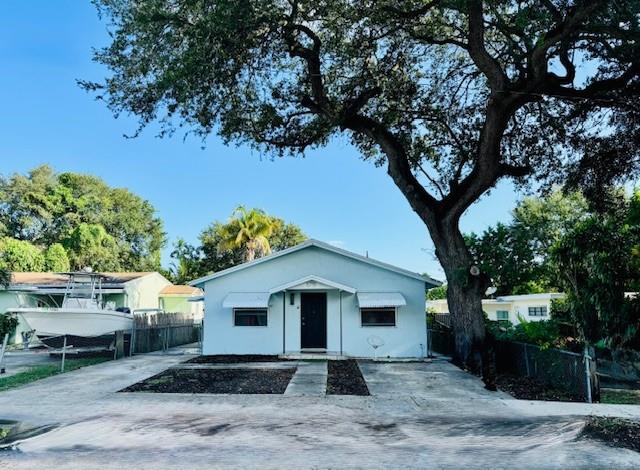 Exceptional opportunity in Hollywood! This renovated 2BR/2BA single-family home includes an independent 1BR/1BA apartment, offering versatility for rental income, multigenerational living, or a private guest suite. Both residences feature private entrances, washer/dryer hookups, and parking for up to four vehicles. A spacious backyard with a storage shed adds outdoor enjoyment and practicality. Conveniently located near shopping, dining, and major thoroughfares, the property delivers comfort, convenience, and strong income potential—currently generating $2,400/month in the main home (lease through March 2026) and $1,500/month in the apartment (month-to-month). This home provides an excellent opportunity for investors or homeowners seeking additional cash flow in a prime Hollywood location